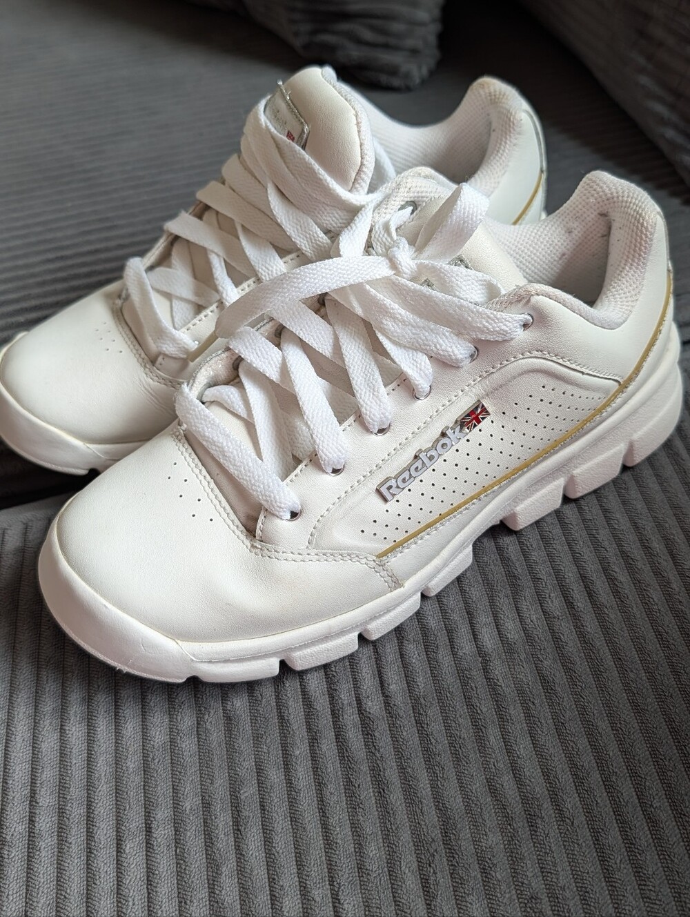 Reebok White Sneakers with Gold Trim